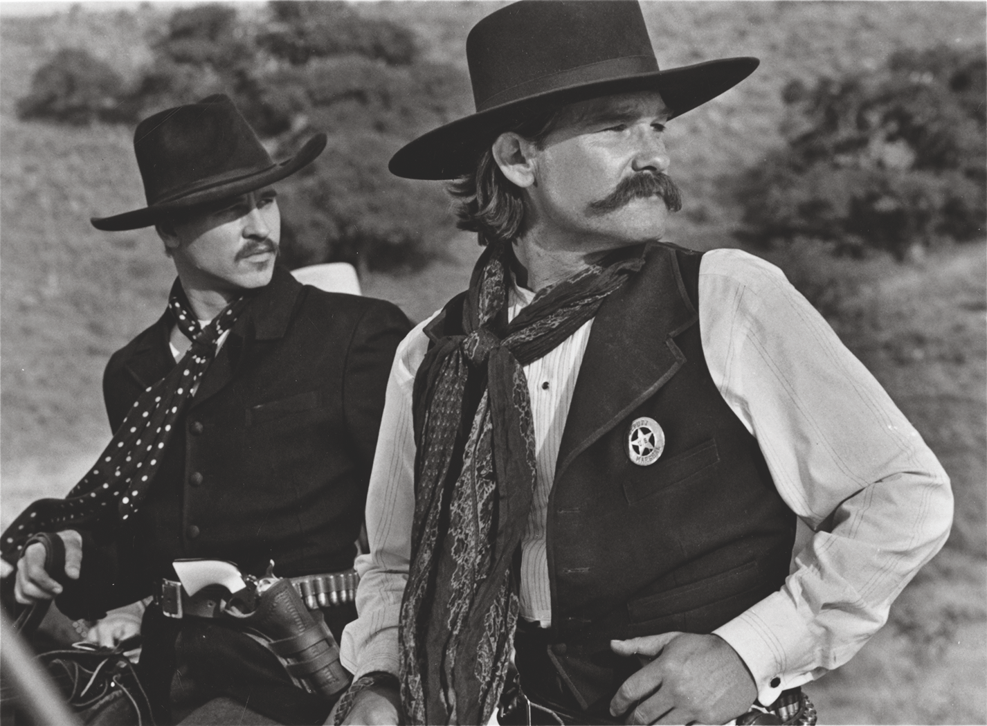 Kurt Russell and Val Kilmer in Tombstone_scaled